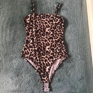 Cheetah bodysuit size small